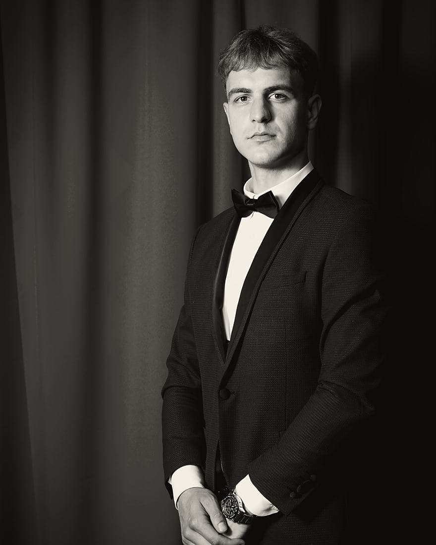 Black tie against the curtain